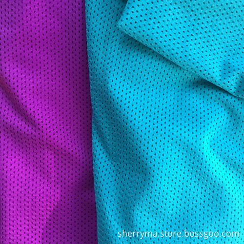 Wicking dyed bird eye mesh weft knitted fabric